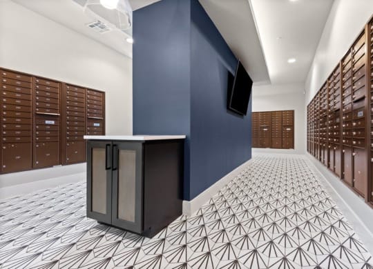 a locker room with wooden lockers and a television