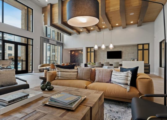 a living room with a large couch and a coffee table