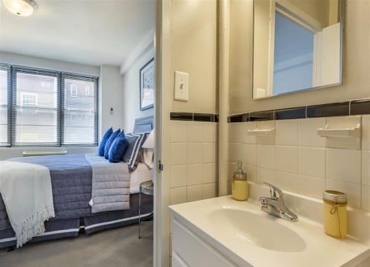 The Broadview Apartments in Baltimore, Maryland Model Bathroom and View into Bedroom