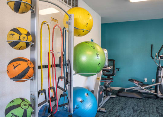 a home gym with a variety of exercise equipment