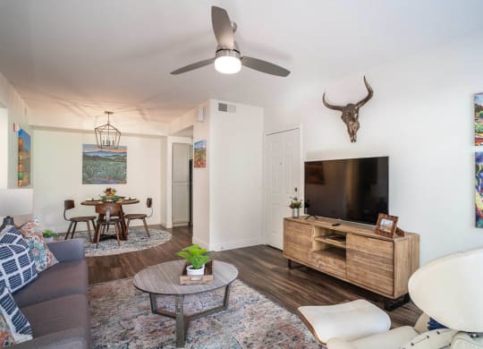 a living room with a couch and a tv