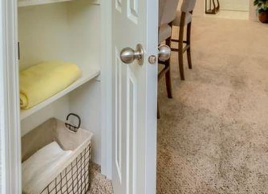 Ridgewood Linen Closet and Living Area View