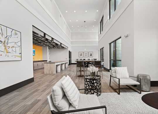 A modern living room with a white couch and a coffee table.