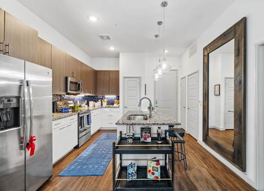 Woodlands at the Preserve Apartments in Garland, Texas Model Kitchen