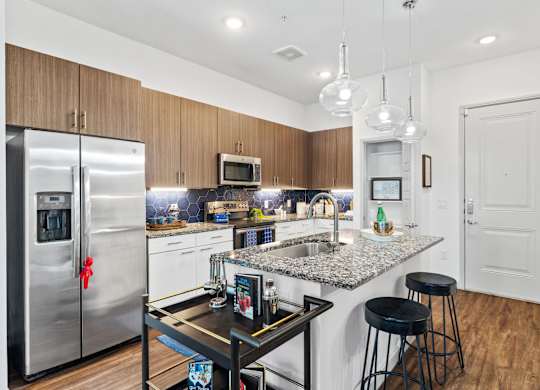 Woodlands at the Preserve Apartments in Garland, Texas Model Kitchen