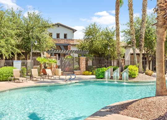 Painted Trails Outdoor Pool with Lounge Chairs