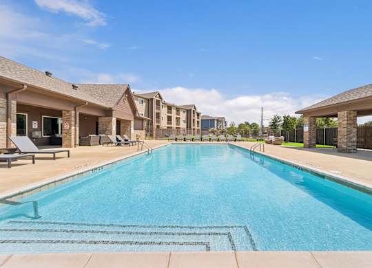 A large swimming pool in a residential area.