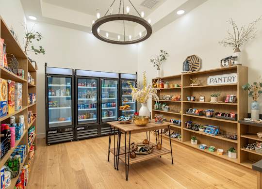 A pantry section in a store with a variety of food items on display.