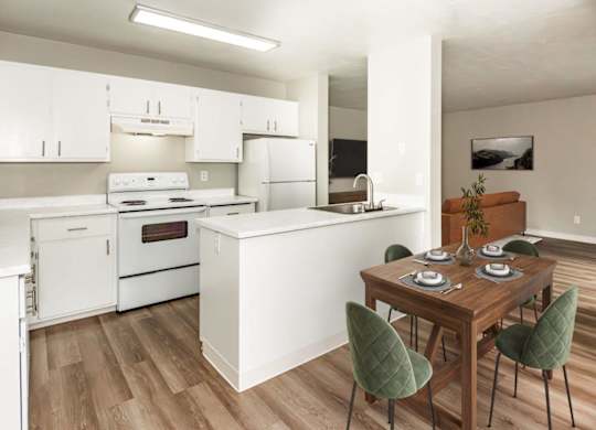 A kitchen with white appliances and a wooden table with green chairs.