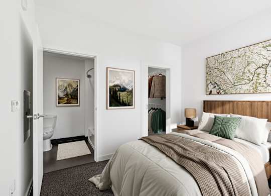 A bedroom with a large bed and a map on the wall.