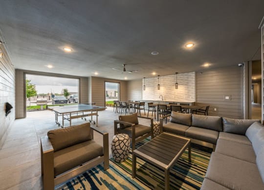 Cromwell at Plum Creek Apartments Clubhouse with Seating and Ping Pong Table