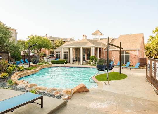 A backyard with a pool and a gazebo.