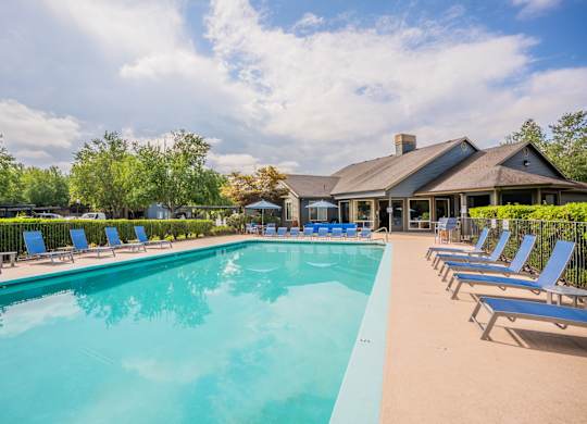 Stonesthrow Apartments Pool with Lounge Chairs