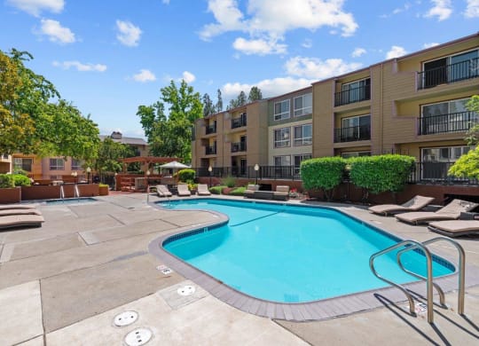 The Crest Pleasant Hill Apartments in California Pool with Lounge Chairs