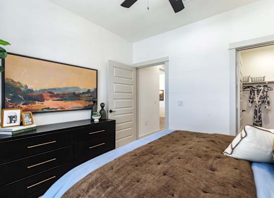 The Depot Apartments in Celina, Texas Bedroom with Attached Walk-In Closet