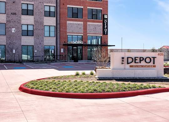 The front of a building with a sign that says