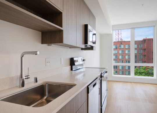 The Warren Apartments kitchen and stainless steel appliances