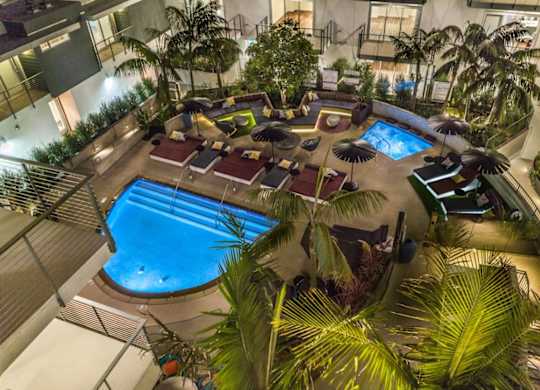 Vinz on Fairfax Apartments in Los Angeles, California Pool with Lounge Chairs