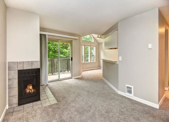 Orchard Ridge Living Room with Fireplace and Balcony