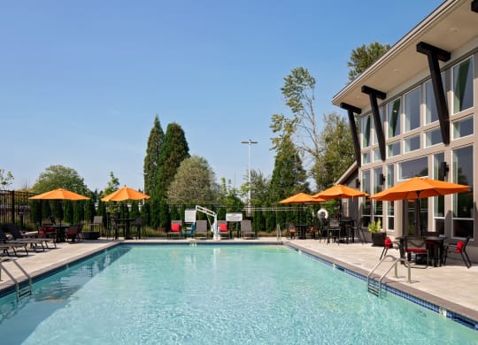 West End District Apartments in Beaverton, Oregon Pool with Lounge Chairs