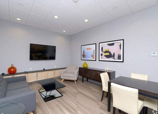 Coworking space with large TV screen at 603 Concord, Cambridge, MA 02138