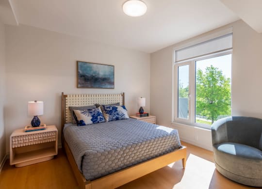 Bedroom With Expansive Windows at Park77 Apartments, Cambridge, Massachusetts