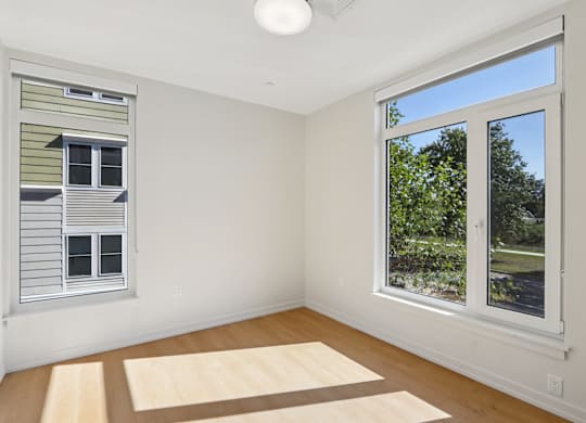 Bedroom with Oversized windows at Park77 Apartments, Cambridge, Massachusetts, 02138