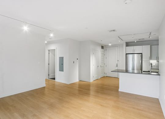Vacant room with wooden floor at Park77 Apartments, Cambridge, 02138