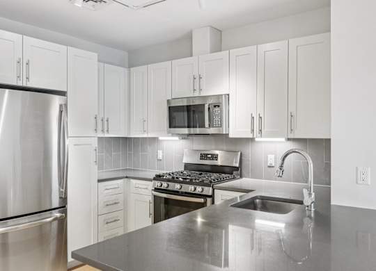 Kitchen with granite countertop at Park77 Apartments, Cambridge, Massachusetts