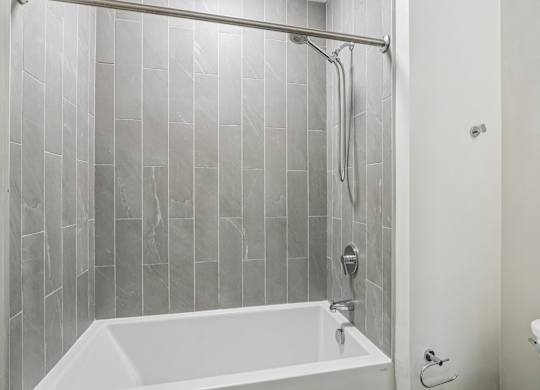 Bathroom with white bathtub at Park77 Apartments, Cambridge, MA, 02138