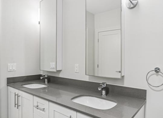 Bathroom with Sink, mirror and faucet at Park77 Apartments, Cambridge, 02138