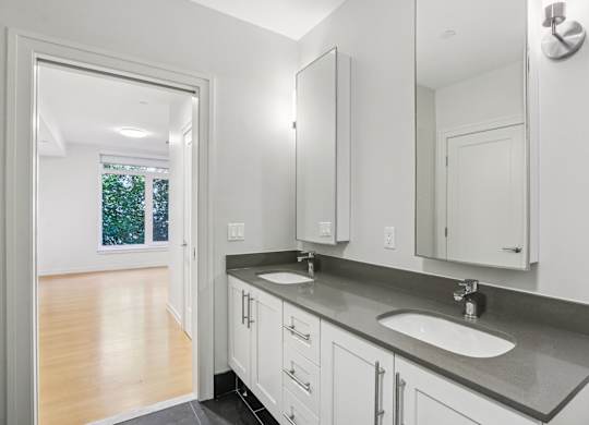 Bathroom with granite countertops at Park77 Apartments, Massachusetts