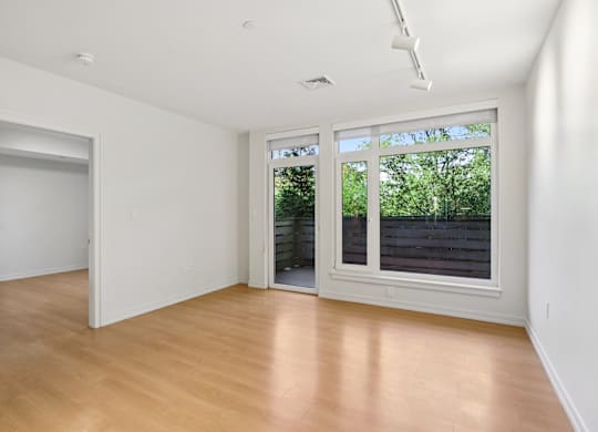 Living room with attached patio at Park77 Apartments, Cambridge, Massachusetts, 02138