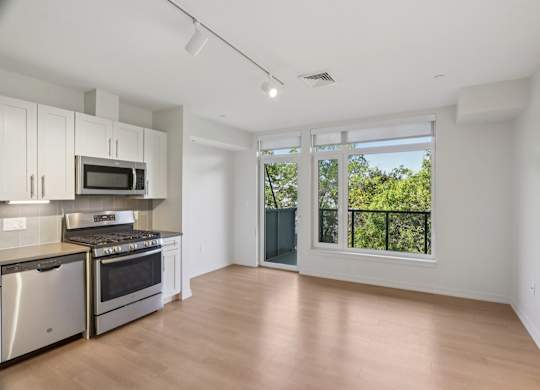 Kitchen with attached patio at Park77 Apartments, Cambridge, Massachusetts