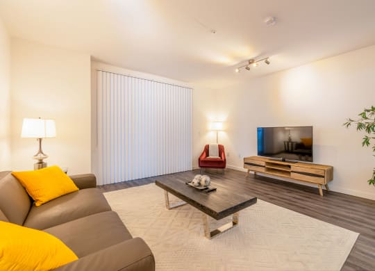 a living room with a couch and a coffee table