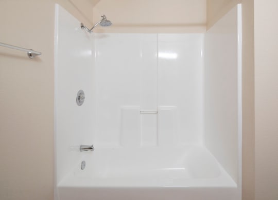 Large bathtub and shower at the Atrium Apartments in San Diego, California.