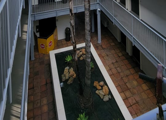 Inner gated courtyard with pleasant ambiance at the Atrium Apartments in downtown San Diego, California.