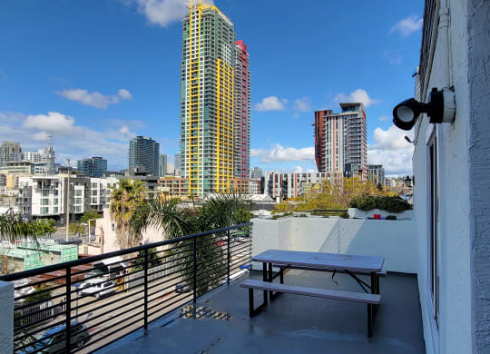 Community balconies with view of downtown San Diego at the Atrium Apartments.