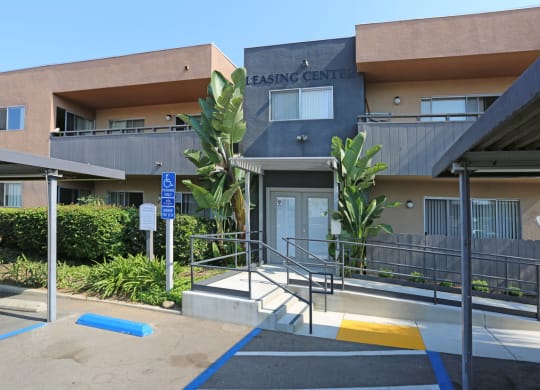 Leasing office enterance from parking lot at Villa Pacific Apartments in Oceanside, California.