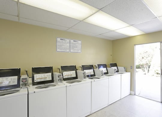 Laundry facility at Villa Pacific Apartments in Oceanside, California.