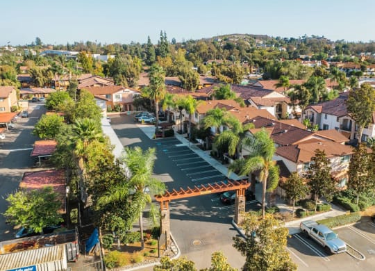 Aerial view of assigned parking and covered parking at The Nines Townhomes in Escondido, California.