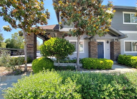Beautifully landscaped enterance to The Nines Townhomes in Escondido, California.
