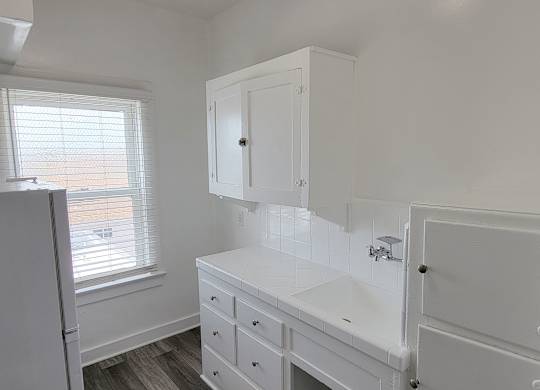 Studio apartment kitchen at the Western at Rosewood apartments in Los Angeles, California.