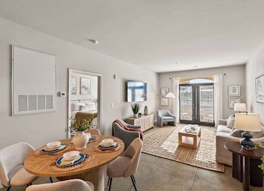 A dining table with chairs around it in a room.