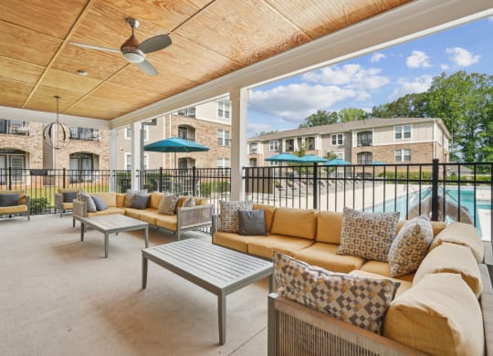 the preserve at ballantyne commons covered patio with couches and tables