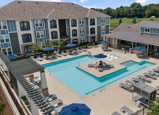 Aerial view of pool and apartment building