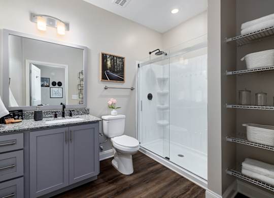 Large bathroom with brown wooden floors