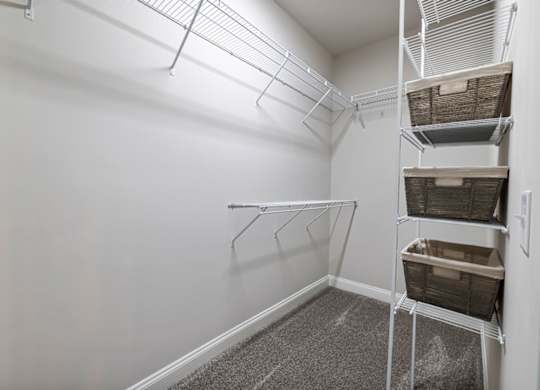 Spacious closet with long shelves