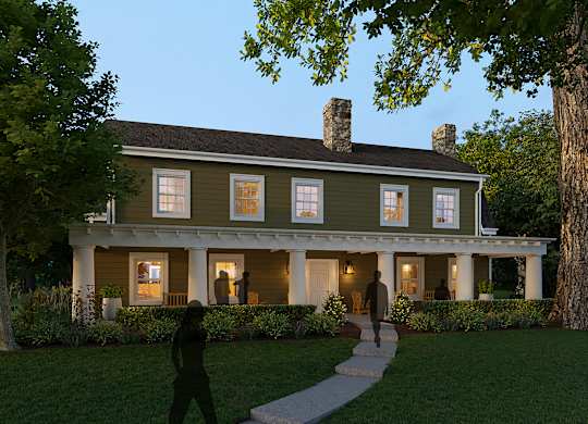 A house with a green exterior and a person walking in front.