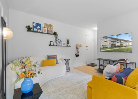living room with sofa and loveseat